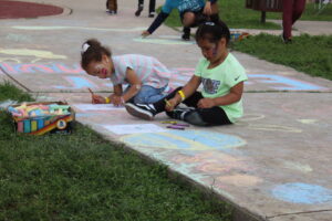 Guardian House Kids Playing with Chalk